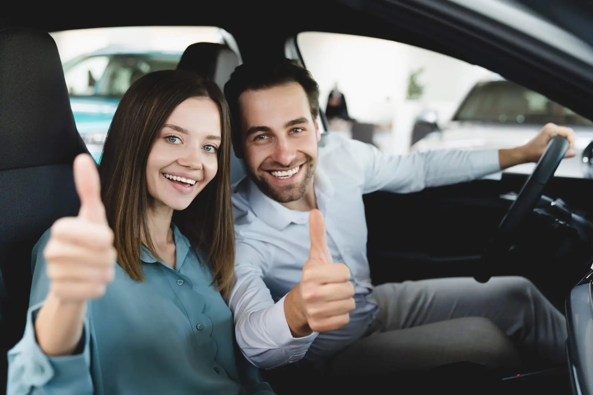 family buying purchasing new car doing test drive