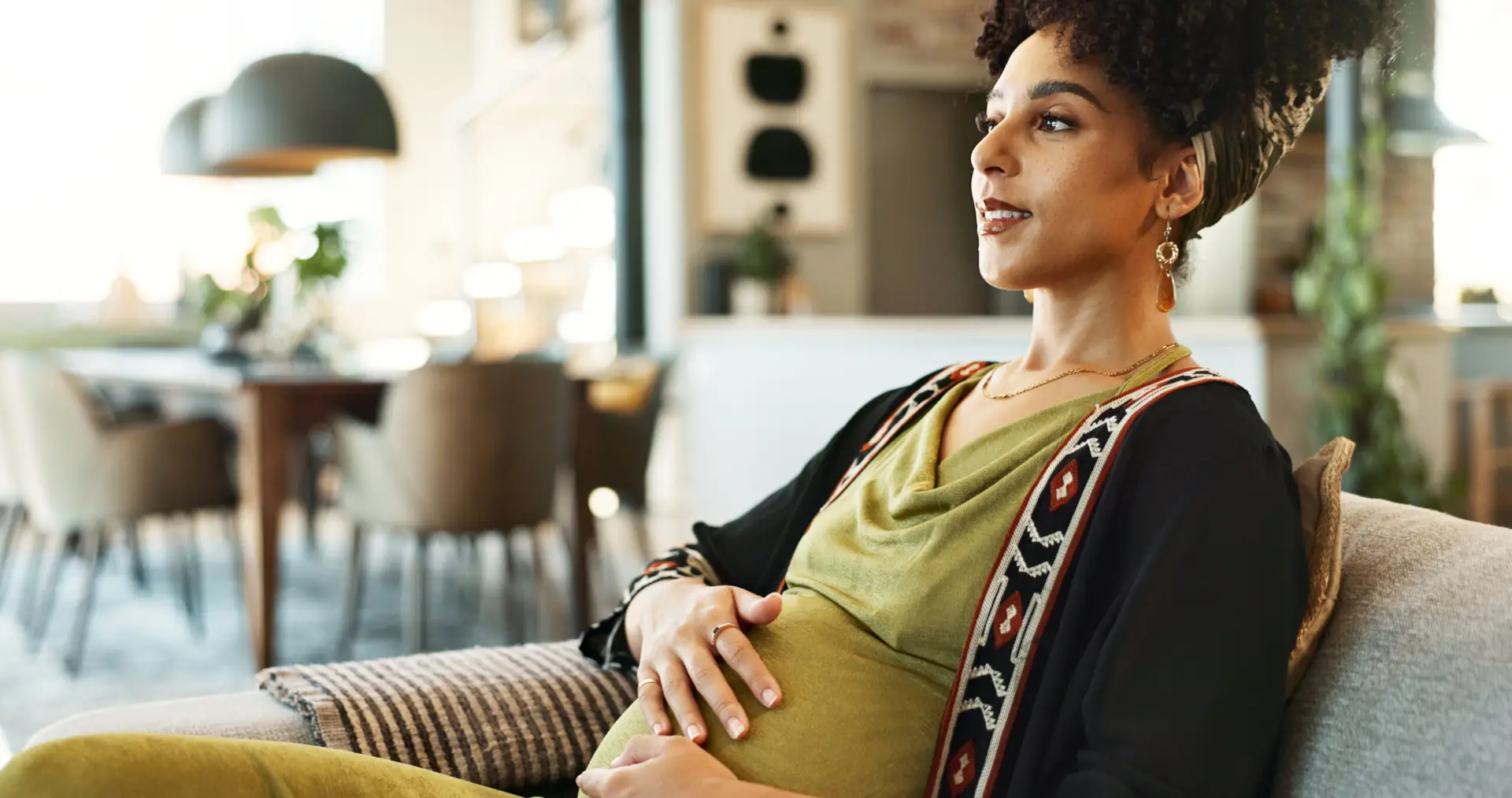 Expectant Mother Thoughtfully Planning Family Future - Pregnant Woman Contemplating Home and Motherhood, Representing Family Protection, Pregnancy, and Financial Security