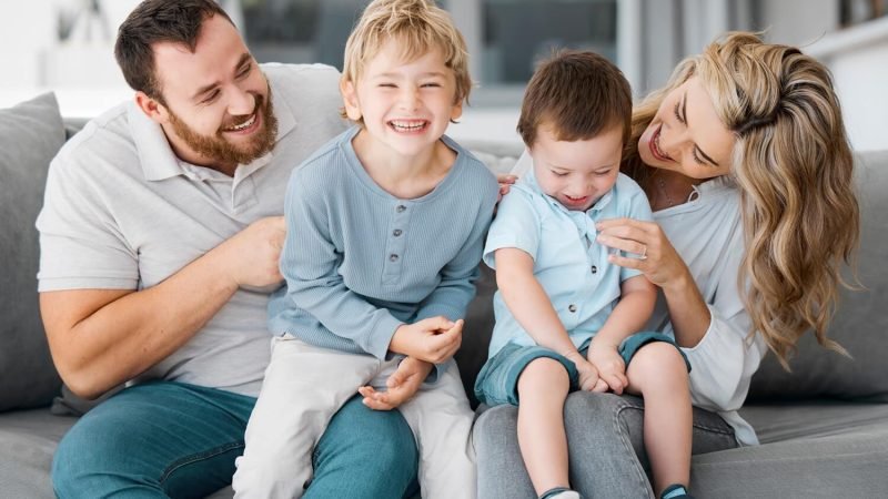 carefree-loving-parents-tickling-and-bonding-with