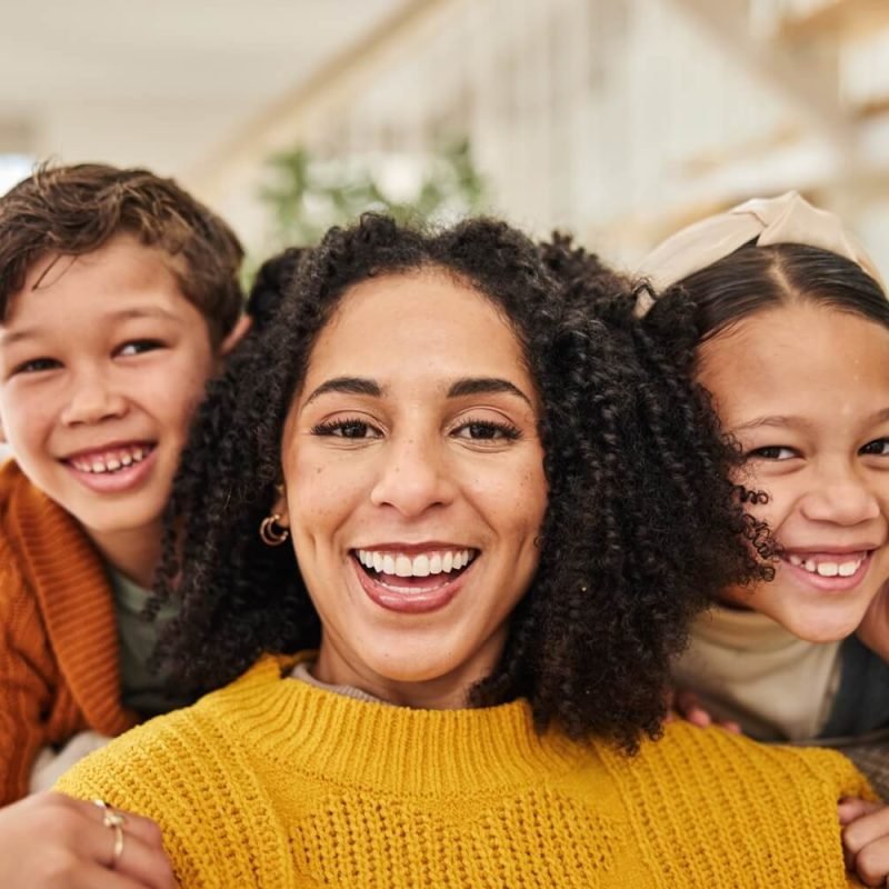 happy-woman-kids-portrait-on-sofa-for-love-weeke-2024-07-16-17-11-21-utc